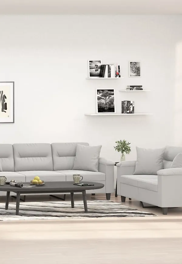 Vacker vidaxl soffa i grå färg gjord i bomull.