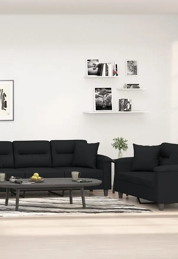 Fin vidaxl soffa i svart färg gjord i bomull.