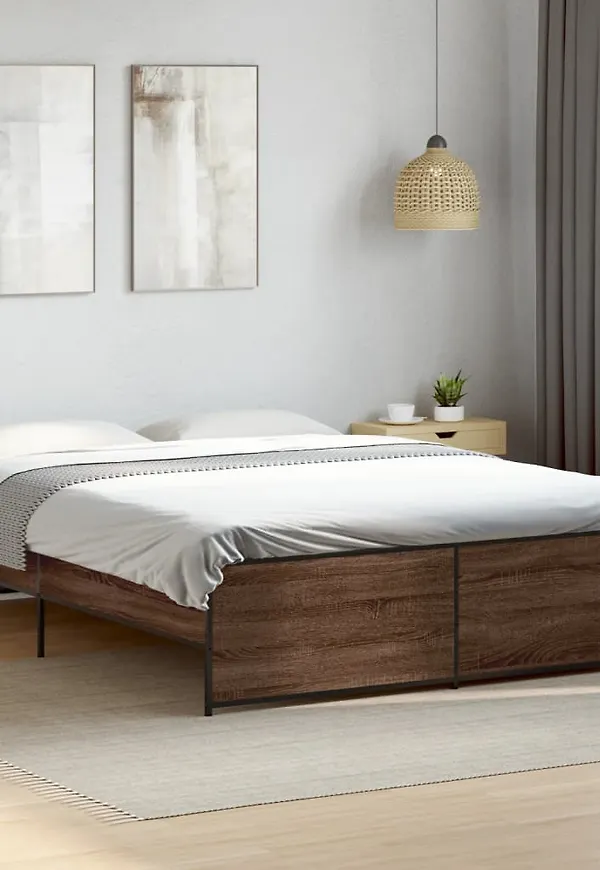 Fantastiskt fin vidaxl säng i brun färg gjord i ek.