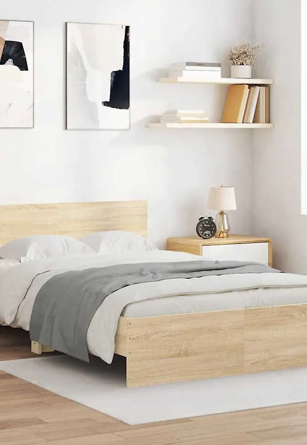 Stilriktig vidaxl säng i brun färg gjord i ek.