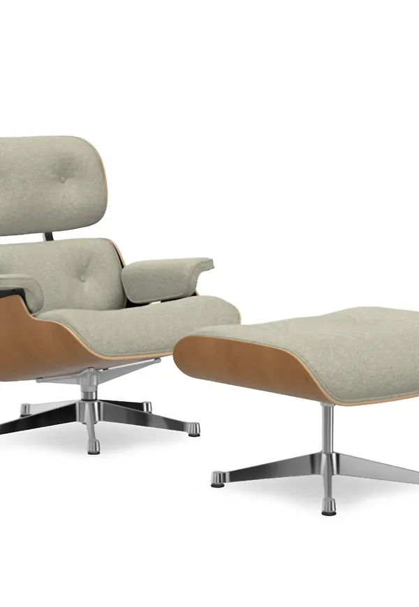 Beige Vitra-läderfåtölj i smickrande modell.