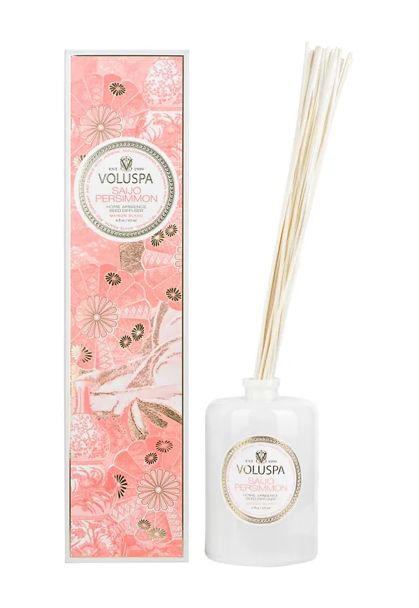 Guldfärgad Voluspa-doftpinne i jättesnygg modell.