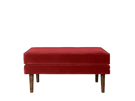 Moderiktig fåtölj i rött från Broste Copenhagen.