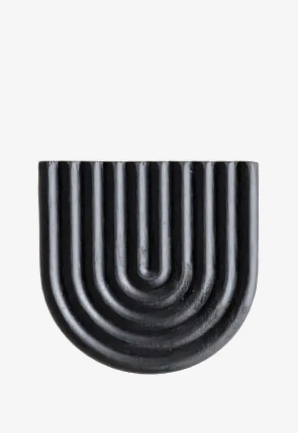 Modern underlägg i svart från Zelected by Houze.